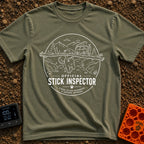 Stick It To’em - T-Shirt in Moss - A line-art illustration of a large dog carrying a massive branch in its mouth in the...