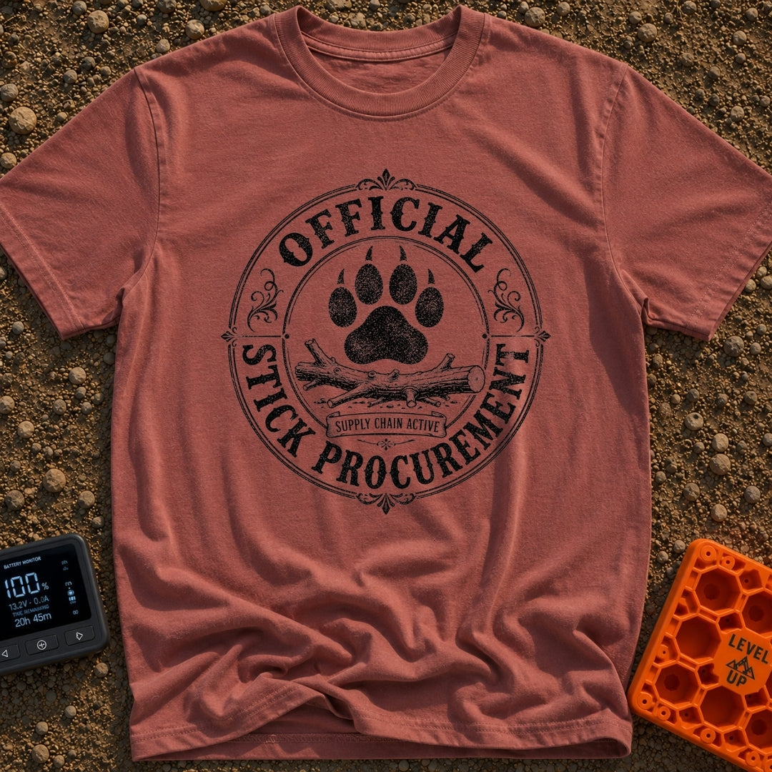 Chief Stick Officer - T-Shirt in Brick - A vintage-style circular badge design featuring a large paw print hovering over...