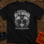 The WiFi Whisperer - T-Shirt in Black - A black and white illustration of two hands wearing star-and-moon-patterned...