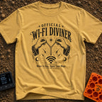 The WiFi Whisperer - T-Shirt in Mustard - A black and white illustration of two hands wearing star-and-moon-patterned...