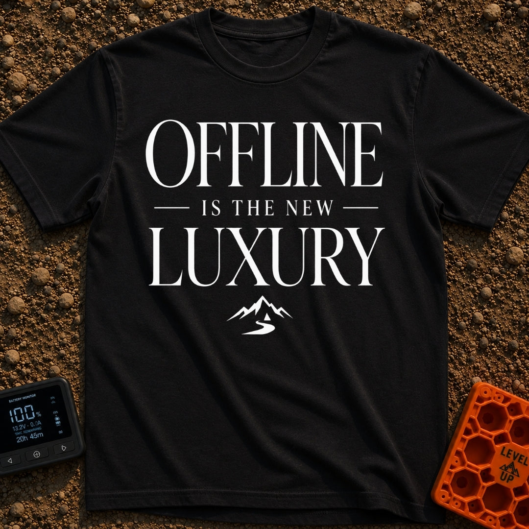 Offline Is Luxury - T-Shirt in Black - The design features the stacked text "OFFLINE IS THE NEW LUXURY" in an elegant...