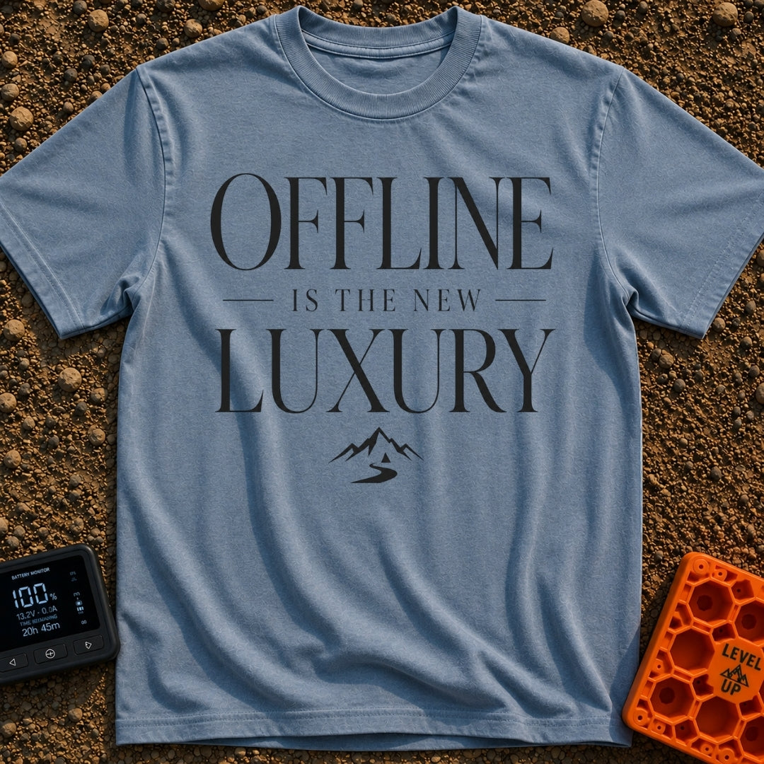 Offline Is Luxury - T-Shirt in Blue Jean - The design features the stacked text "OFFLINE IS THE NEW LUXURY" in an elegant...
