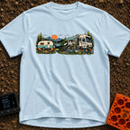 Good As Old - T-Shirt in Chambray - An illustration comparing two campsite setups in front of a mountain lake at sunset,...