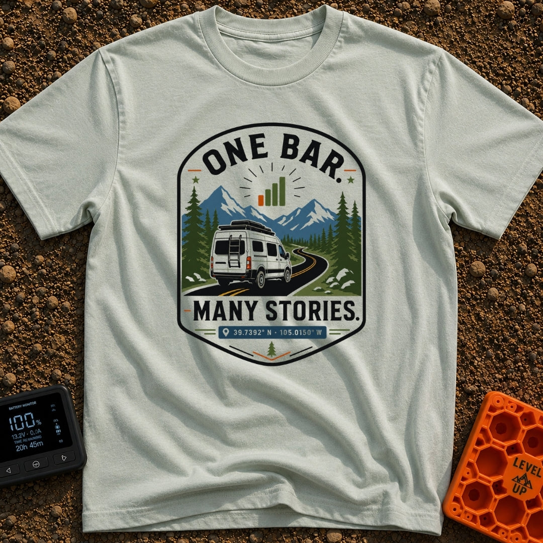 One Bar Many Stories - T-Shirt in Bay - A badge-style design showing a white camper van driving along a winding mountain...