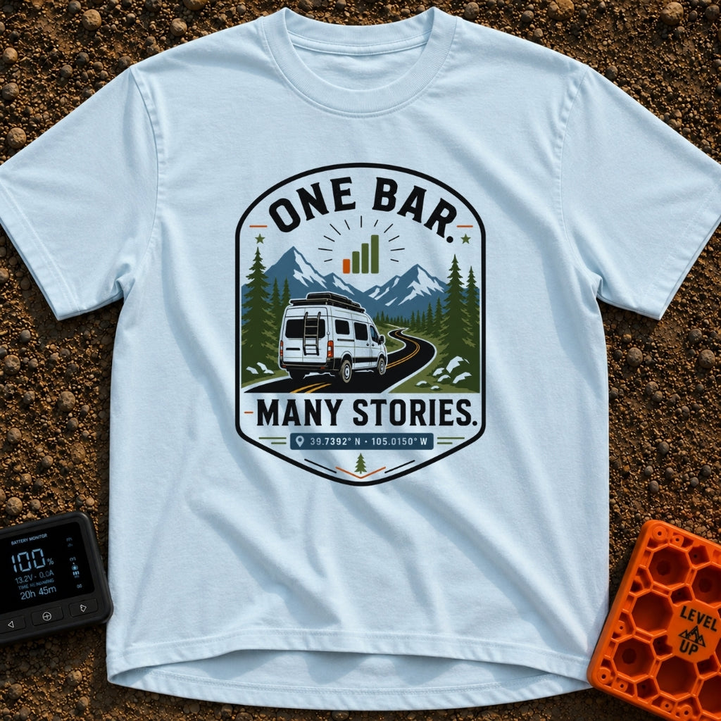 One Bar Many Stories - T-Shirt in Chambray - A badge-style design showing a white camper van driving along a winding...