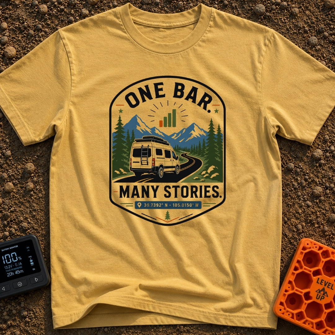 One Bar Many Stories - T-Shirt in Mustard - A badge-style design showing a white camper van driving along a winding...