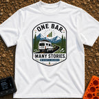 One Bar Many Stories - T-Shirt in White - A badge-style design showing a white camper van driving along a winding...