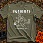 Just One More Mile - T-Shirt in Moss - A white line drawing on a black background showing a hiker with their arms full of...
