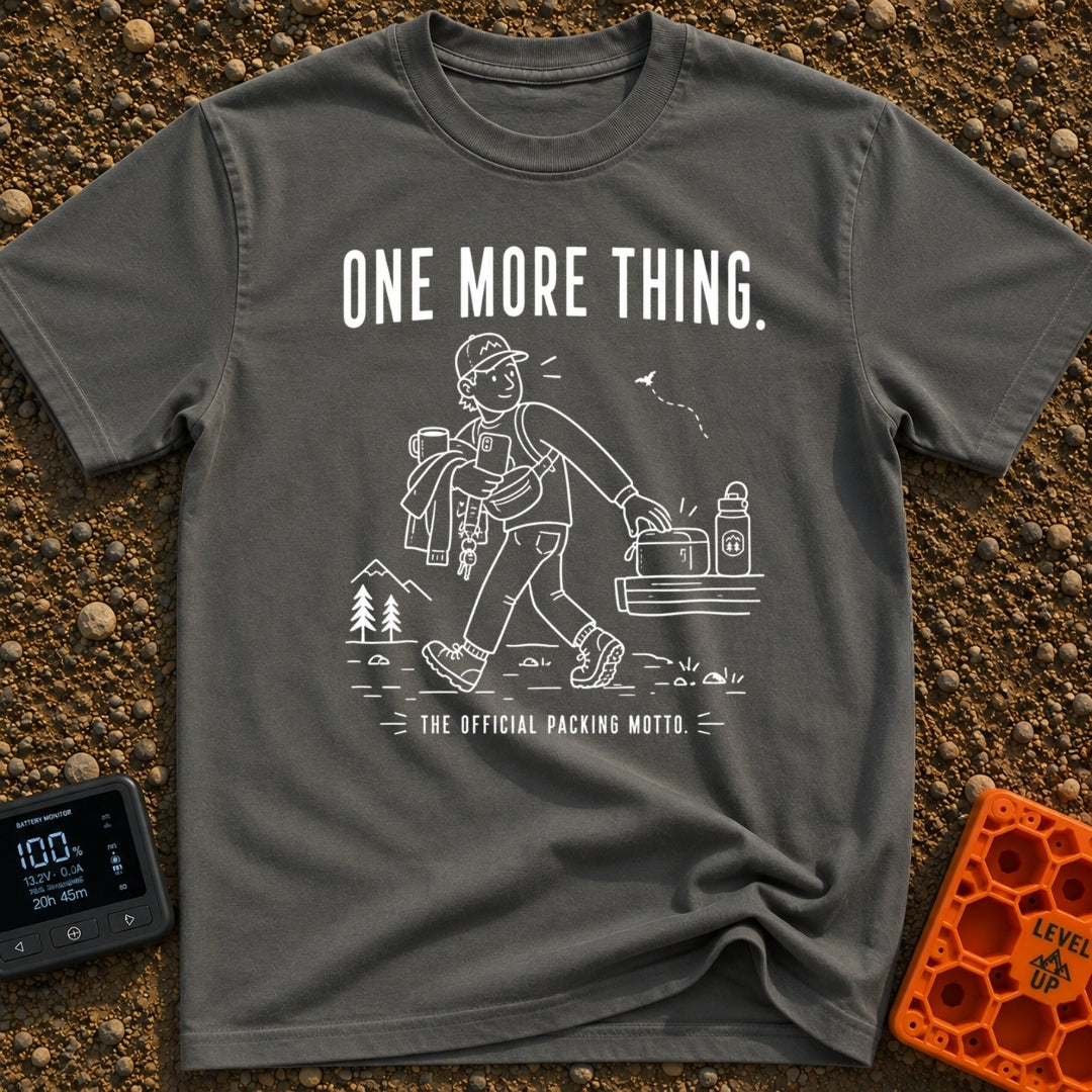 Just One More Mile - T-Shirt in Pepper - A white line drawing on a black background showing a hiker with their arms full...