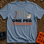 One Peg Started Drama - T-Shirt in Blue Jean - A cartoon illustration showing four tent pegs driven into the ground, with...