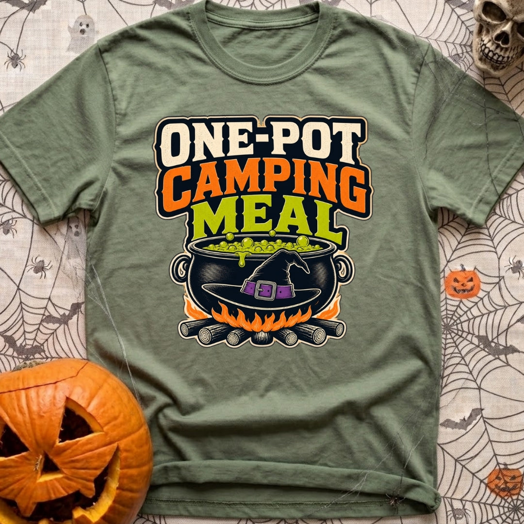 One Pot Wonder - T-Shirt in Moss - The text "ONE-POT CAMPING MEAL" is displayed above an illustration of a black witch's...