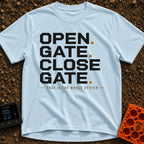 Designated Gate Opener - T-Shirt in Chambray - A text-based design featuring the words 'OPEN. GATE. CLOSE. GATE.' stacked...