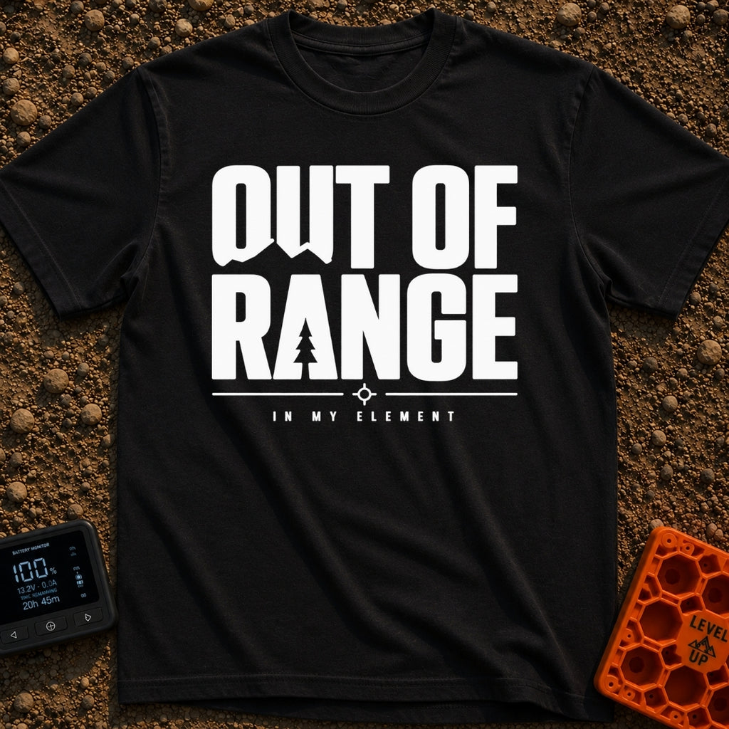Happily Out Of Range - T-Shirt in Black - Typographic design featuring large, bold text reading "OUT OF RANGE" with a...