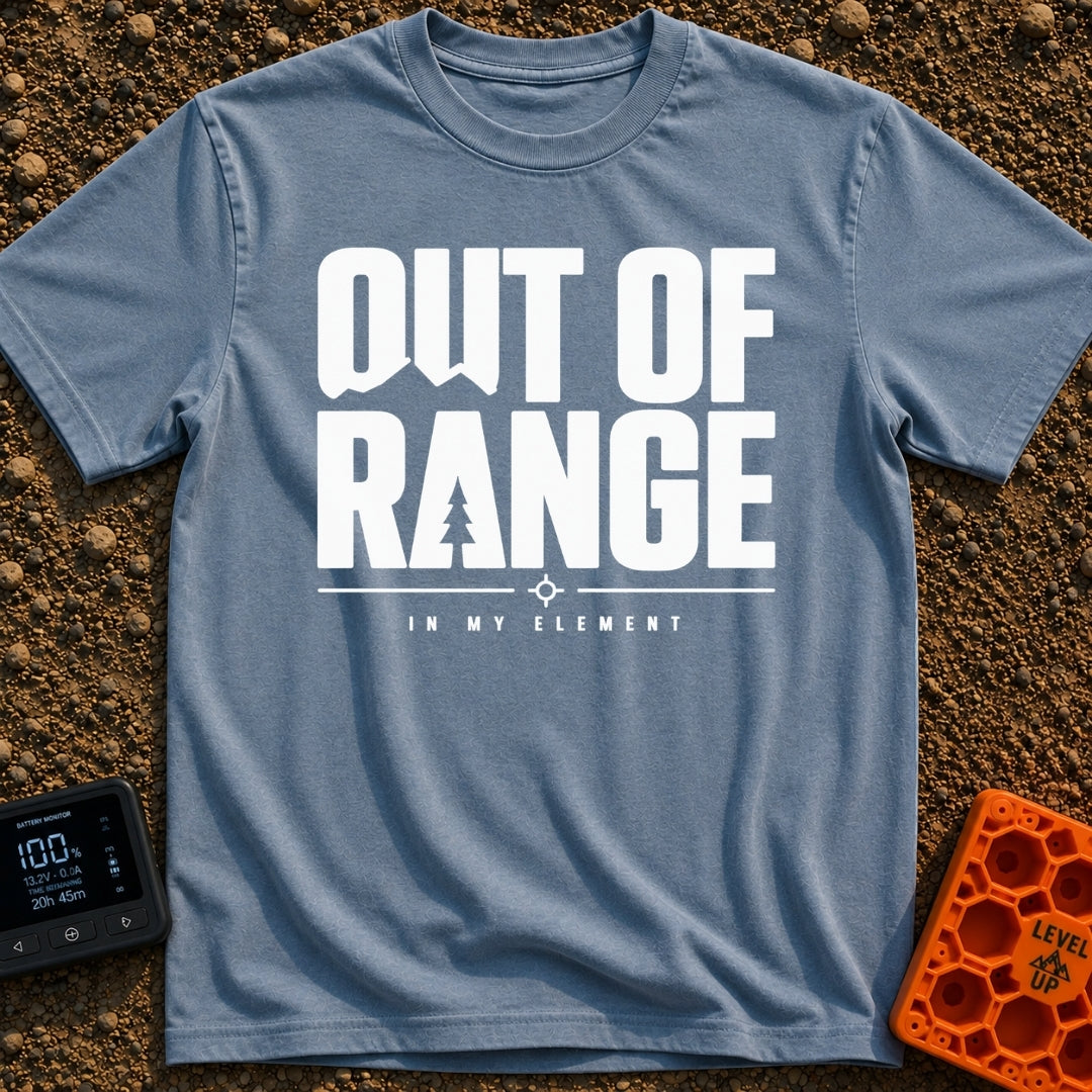 Happily Out Of Range - T-Shirt in Blue Jean - Typographic design featuring large, bold text reading "OUT OF RANGE" with a...