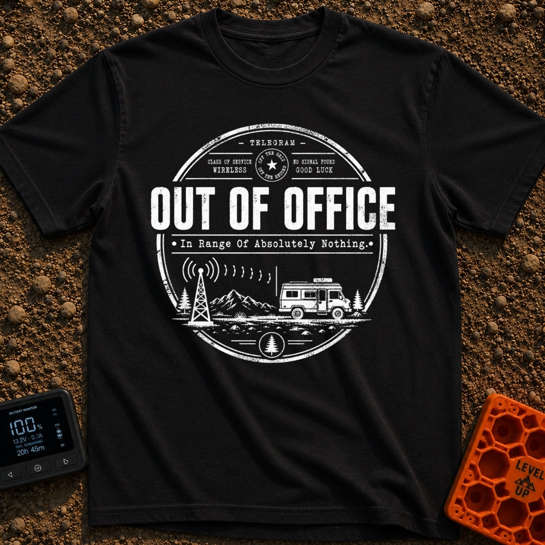 Off The Grid Telegram - T-Shirt in Black - A circular badge design featuring a camper van parked in a mountainous...