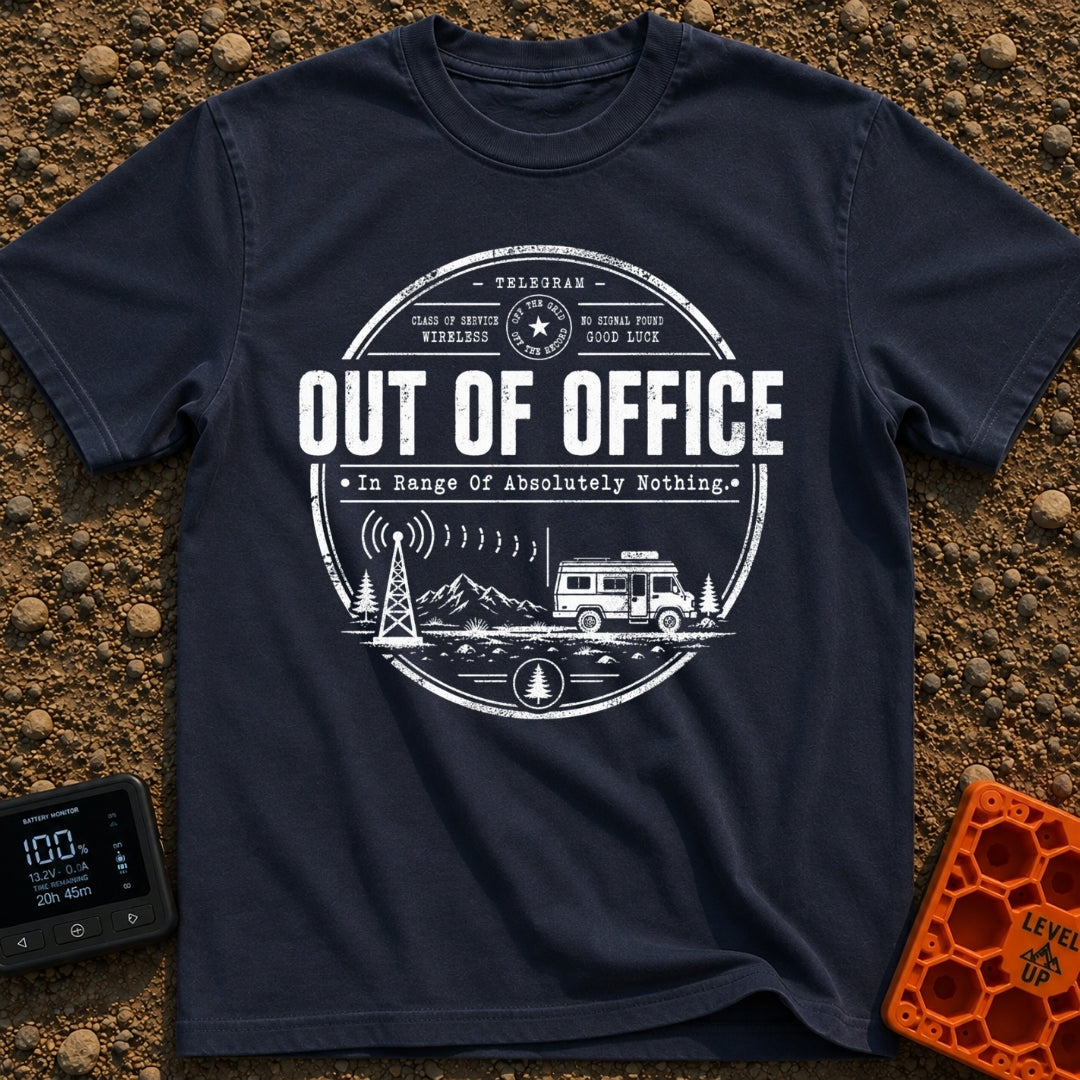 Off The Grid Telegram - T-Shirt in Navy - A circular badge design featuring a camper van parked in a mountainous...