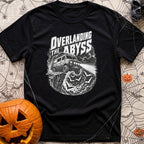 Off The Deep End - T-Shirt in Black - A black and white illustration of a rugged 4x4 camper van driving off a rocky cliff...