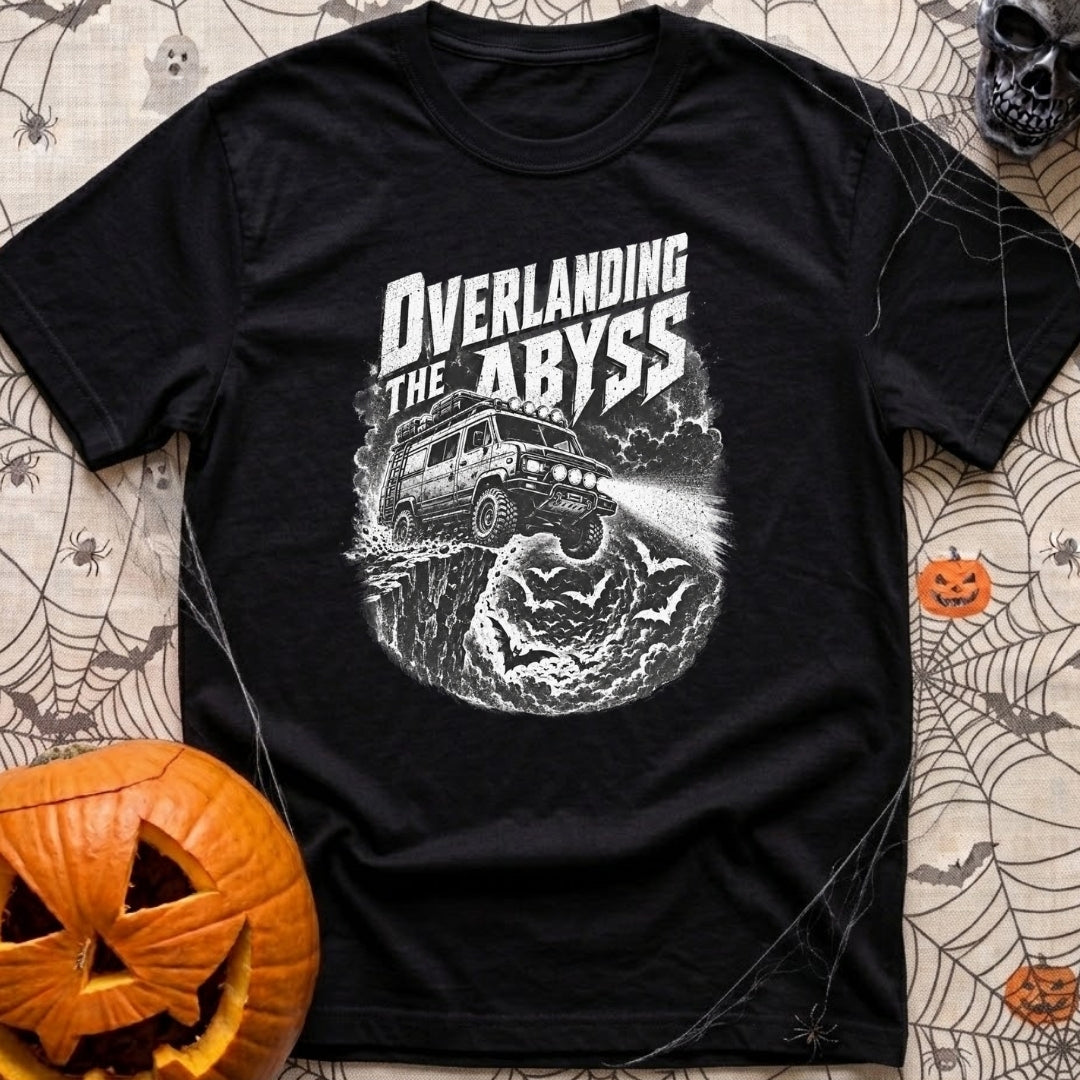 Off The Deep End - T-Shirt in Black - A black and white illustration of a rugged 4x4 camper van driving off a rocky cliff...
