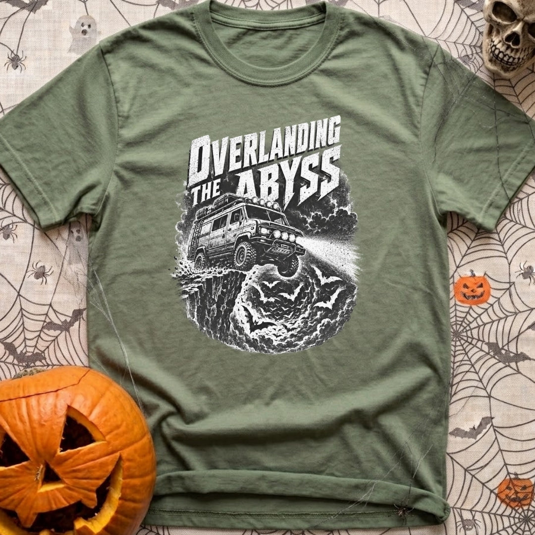 Off The Deep End - T-Shirt in Moss - A black and white illustration of a rugged 4x4 camper van driving off a rocky cliff...