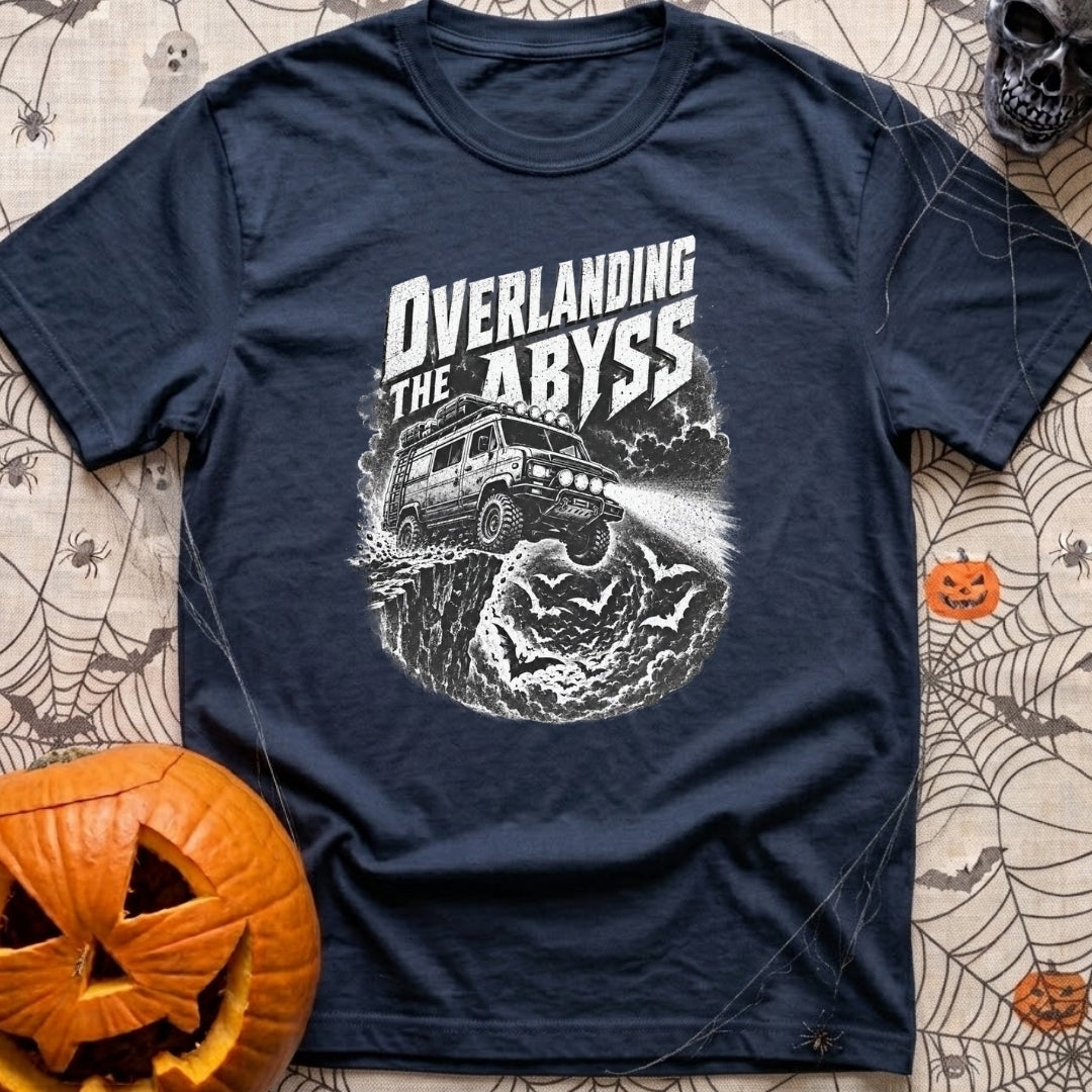 Off The Deep End - T-Shirt in Navy - A black and white illustration of a rugged 4x4 camper van driving off a rocky cliff...