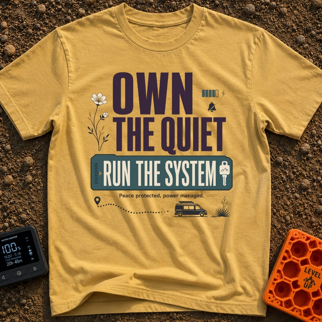 Silent Power Play - T-Shirt in Mustard - A typographical design reading "OWN THE QUIET RUN THE SYSTEM" and "Peace...