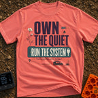Silent Power Play - T-Shirt in Watermelon - A typographical design reading "OWN THE QUIET RUN THE SYSTEM" and "Peace...
