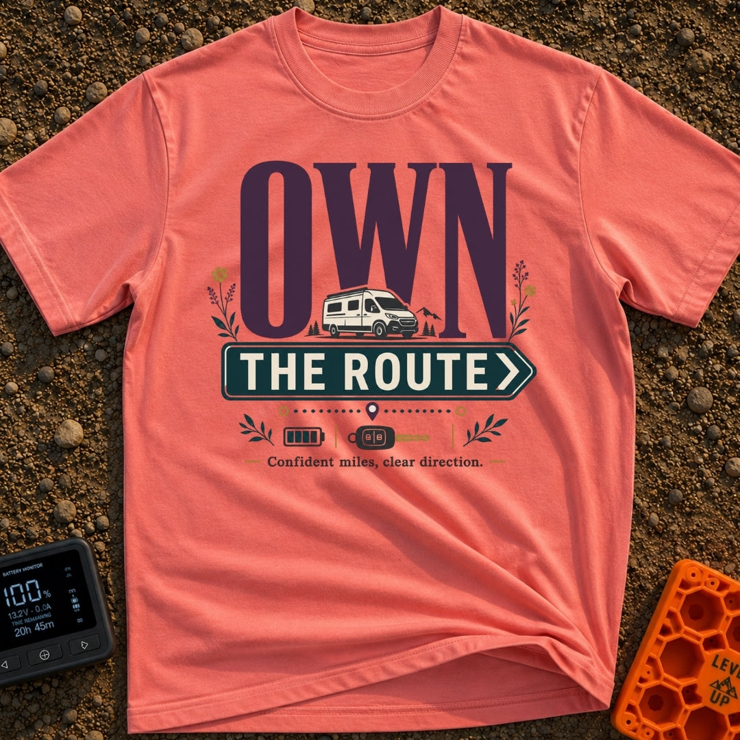 Own The Route - T-Shirt in Watermelon - The design features the large text "OWN" behind a white camper van, with the...