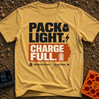 Pack Light Charge Full - T-Shirt in Mustard - A typographic design featuring the large text "PACK LIGHT." next to a...