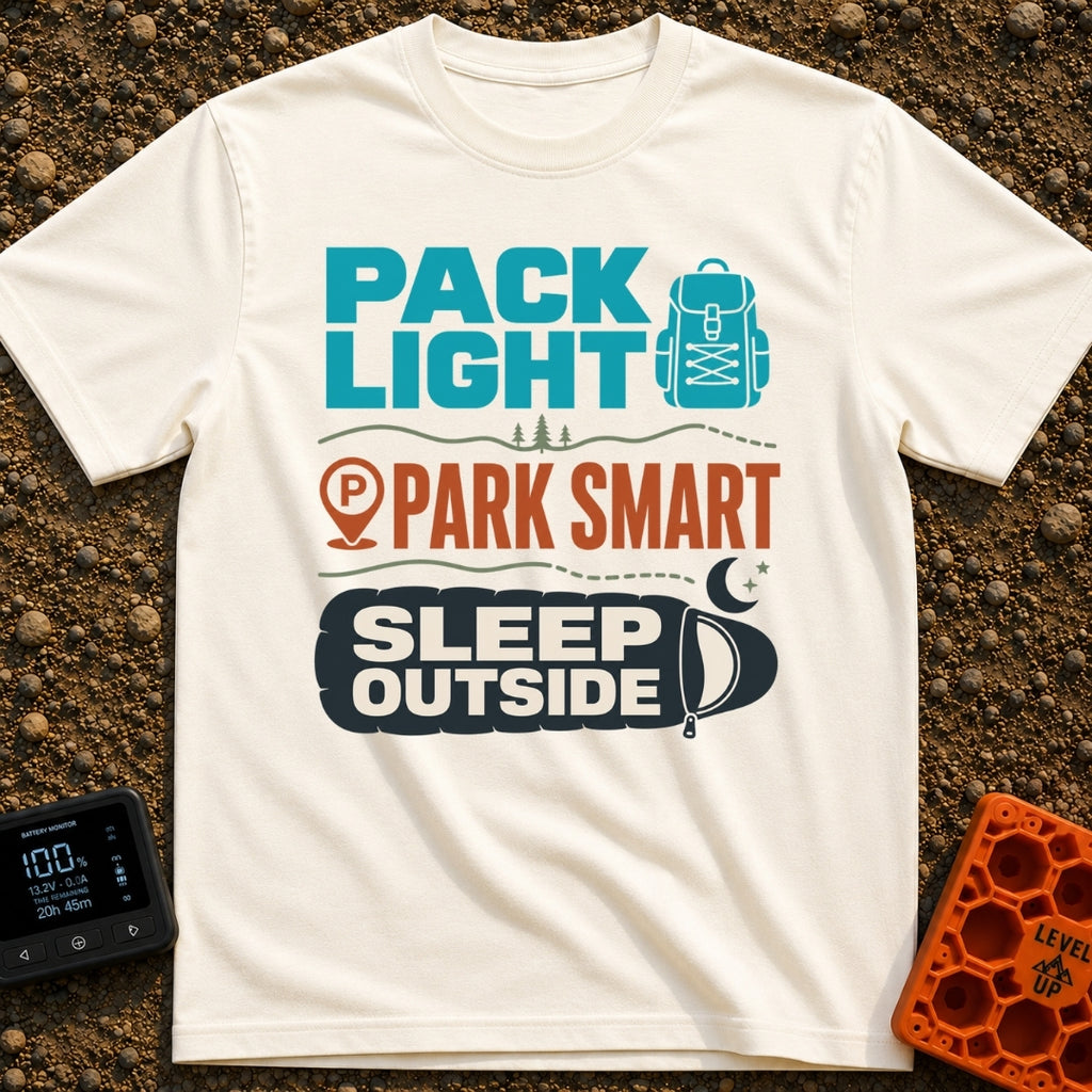 Wander, Park, Hibernate - T-Shirt in Ivory - A typographic design with three sections featuring the text "PACK LIGHT"...