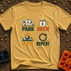 Brew View Repeat - T-Shirt in Mustard - A four-part graphic design featuring a Class C motorhome above the word 'PARK', a...