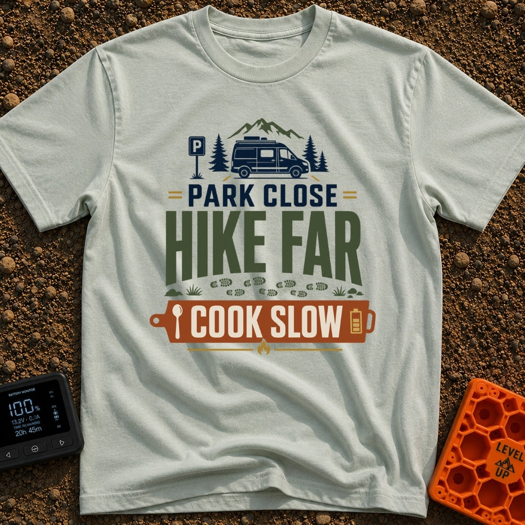 Hike Far Cook Slow - T-Shirt in Bay - A typographic graphic showing a camper van parked near mountains and pine trees,...