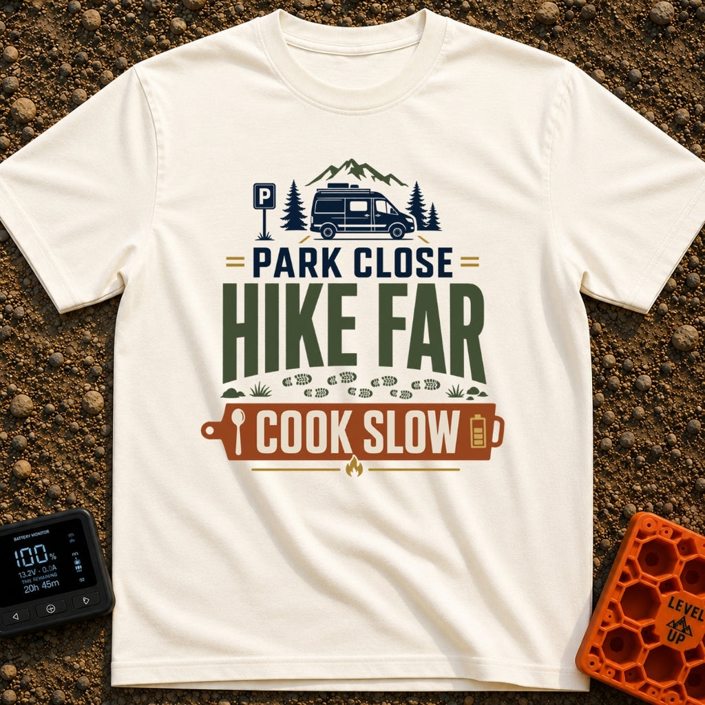Hike Far Cook Slow - T-Shirt in Ivory - A typographic graphic showing a camper van parked near mountains and pine trees,...