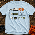 Park Level Repeat - T-Shirt in Chambray - A three-step checklist graphic featuring the words "PARK.", "LEVEL.", and...