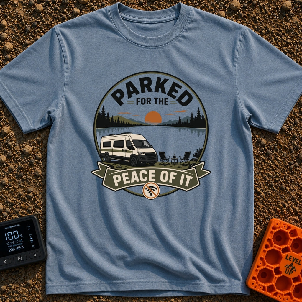 Parked For Some Peace - T-Shirt in Blue Jean - An illustration of a camper van parked next to a calm lake with mountains...