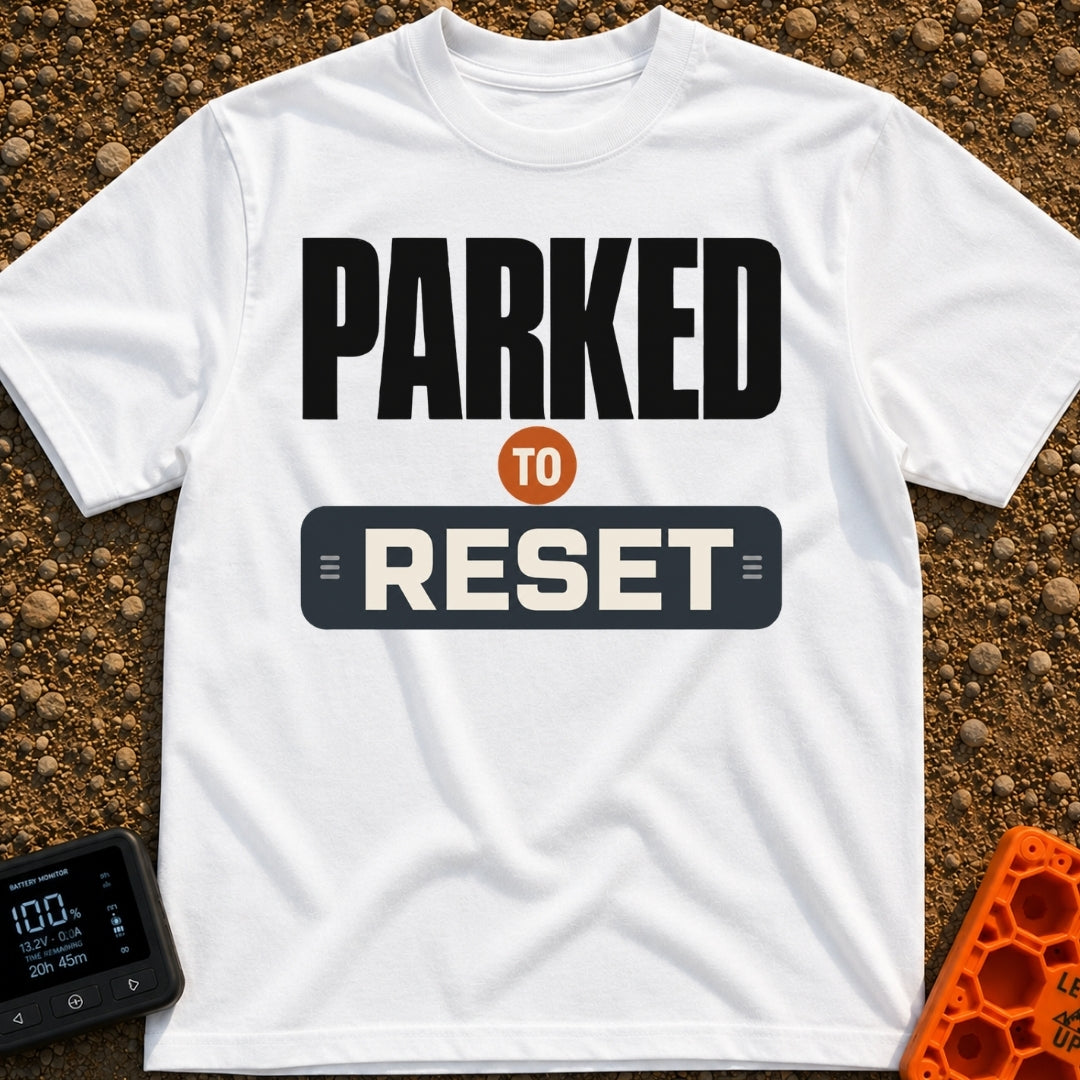 Parked To Reset - T-Shirt in White - A typographic design that reads "PARKED TO RESET". The word "PARKED" is in large...
