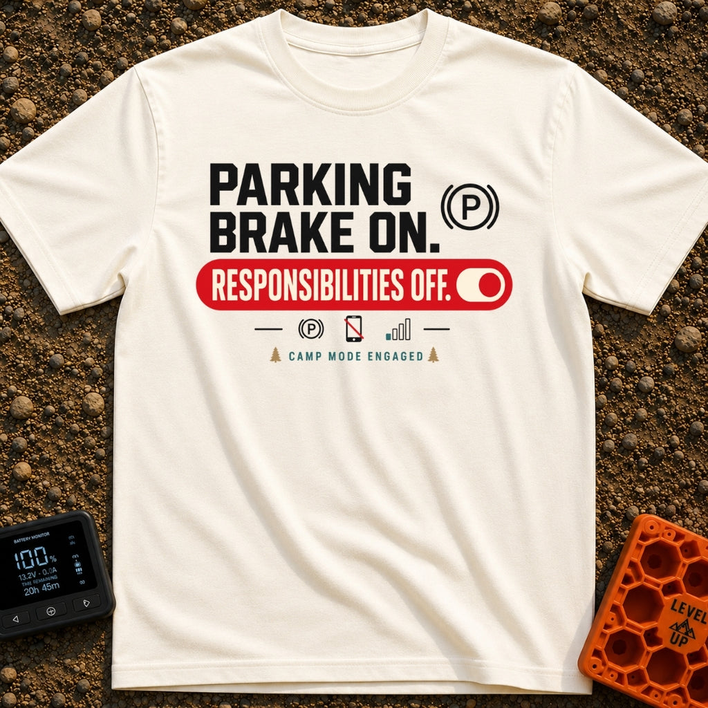 Brakes On Responsibilities Off - T-Shirt in Ivory - A typographic design stating "PARKING BRAKE ON." next to a (P) symbol...