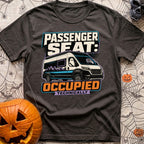 Technically Riding Shotgun - T-Shirt in Graphite - A white camper van with mountain graphics on its side, featuring a...