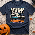Technically Riding Shotgun - T-Shirt in Navy - A white camper van with mountain graphics on its side, featuring a classic...