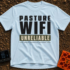 Nature's Patchy Signal - T-Shirt in Chambray - A text-based design featuring the stacked words "PASTURE WIFI", followed...
