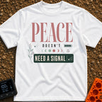 Peace Needs No Signal - T-Shirt in White - A typographic design reading "PEACE DOESN'T NEED A SIGNAL" accompanied by...