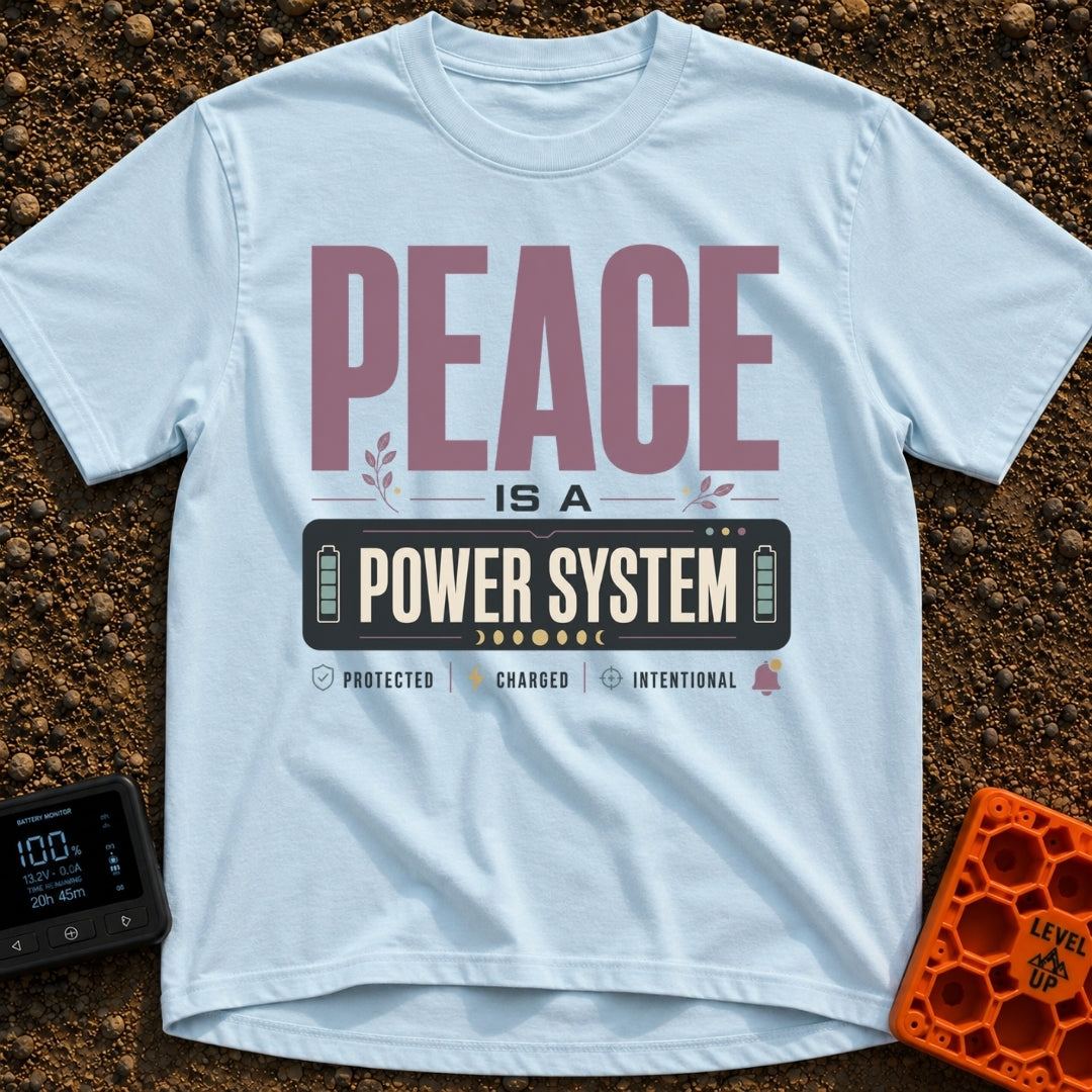 Peace Power System - T-Shirt in Chambray - A typographic design featuring the large text "PEACE IS A POWER SYSTEM", where...