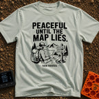 Peaceful Until Maps Lie - T-Shirt in Bay - A black and white illustration of a bearded hiker wearing a backpack and cap,...