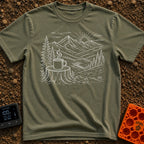 Peak Charge Brew - T-Shirt in Moss - A white line sketch of a steaming camp mug resting on a tree stump in the...