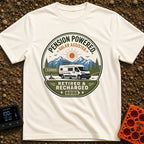 Retired and Recharged - T-Shirt in Ivory - A badge-style illustration showing a white camper van with a roof-mounted...