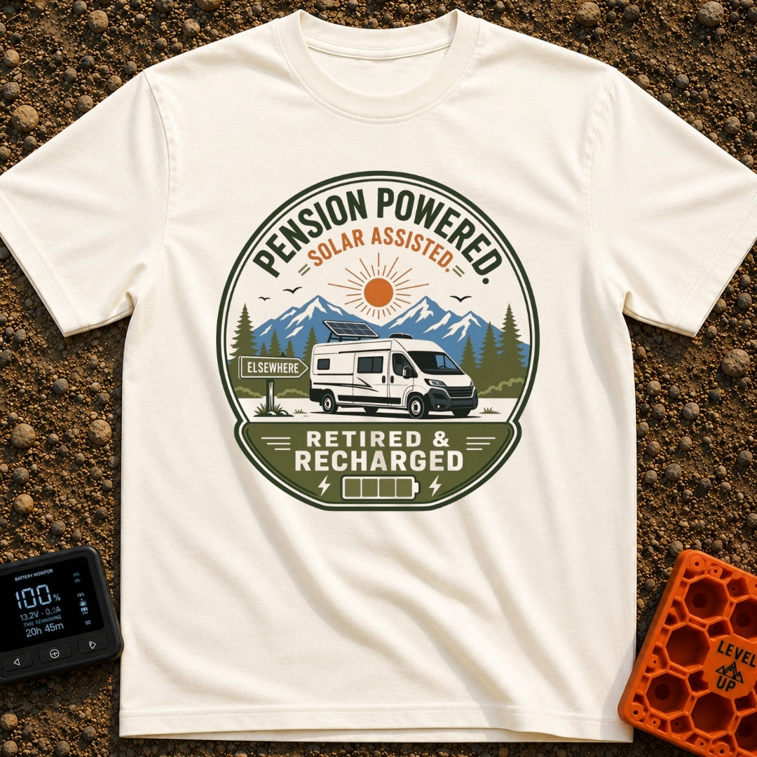 Retired and Recharged - T-Shirt in Ivory - A badge-style illustration showing a white camper van with a roof-mounted...