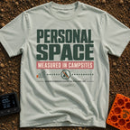Measured In Campsites - T-Shirt in Bay - The design features large text reading "PERSONAL SPACE" and "MEASURED IN...