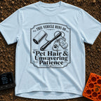Powered By Pet Hair - T-Shirt in Chambray - A vintage-style black and white illustration featuring a lint roller next to...