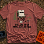 Pillow CEO Vibes - T-Shirt in Brick - A cartoon illustration of a large pillow wearing sunglasses sitting in a green...