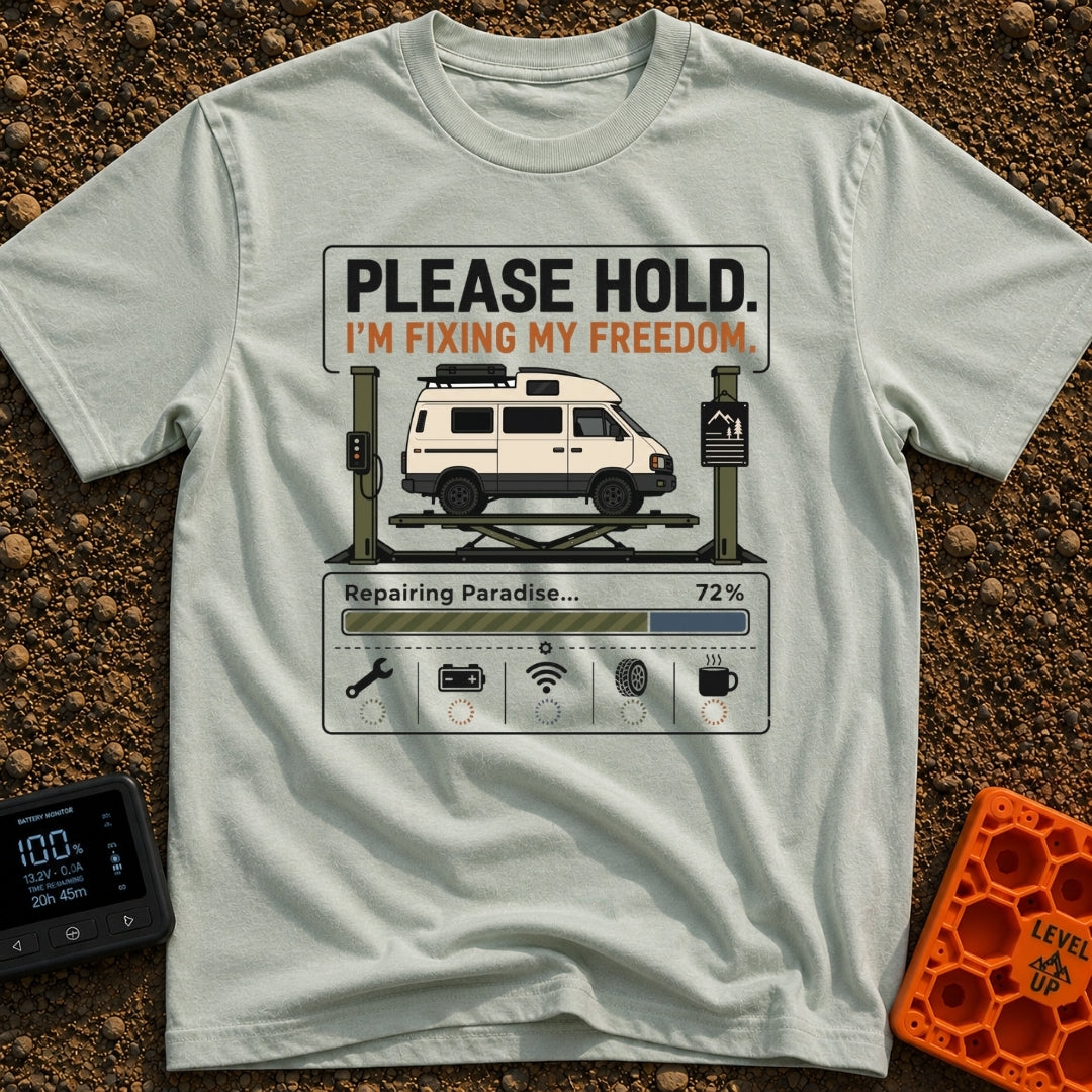 Fixing My Freedom - T-Shirt in Bay - A white camper van is shown elevated on a green auto lift beneath the text "PLEASE...
