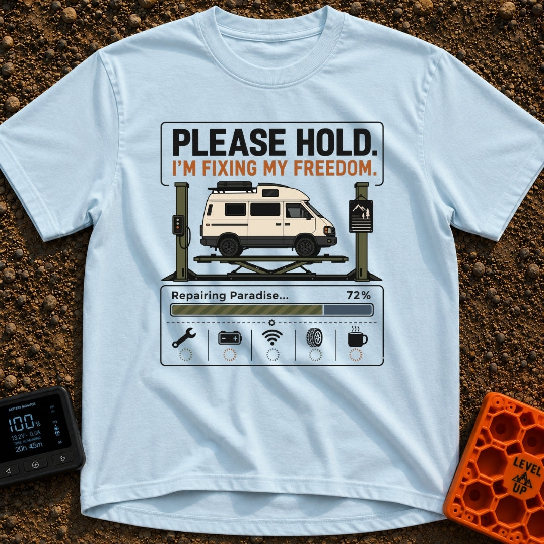Fixing My Freedom - T-Shirt in Chambray - A white camper van is shown elevated on a green auto lift beneath the text...